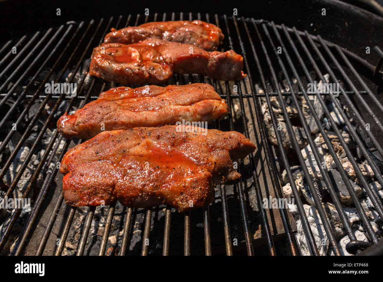 Pork smoked barbecue cooked on charcoal grill Stock Photo Alamy