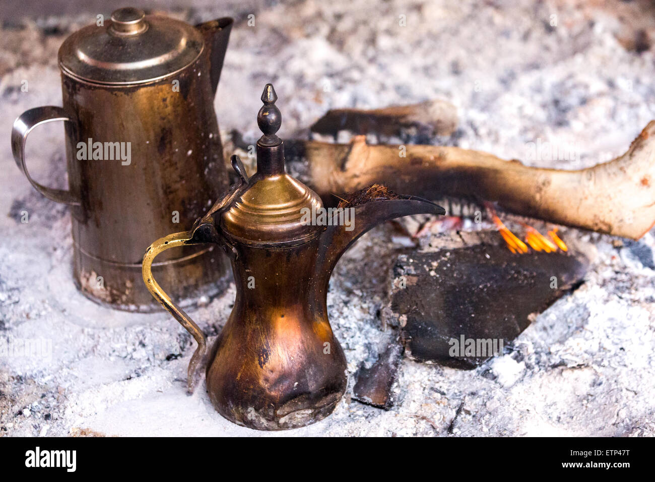 Wadi Rum.Arabic coffee pot at fireplace Stock Photo