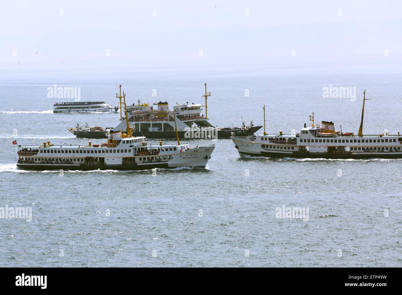 Ferries in the Crowded congested waters of the port of Istanbul Turkey Stock Photo