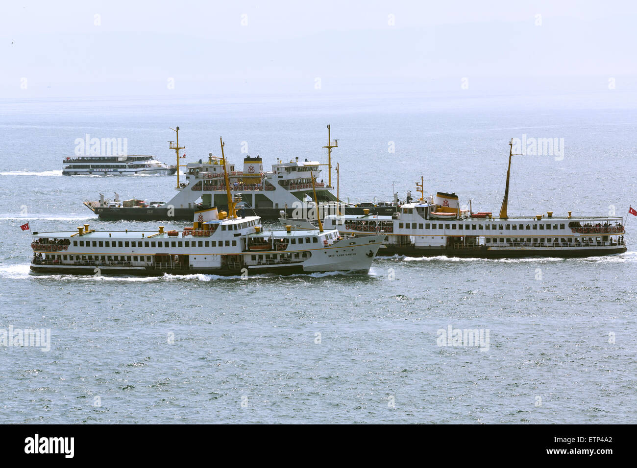 Ferries in the Crowded congested waters of the port of Istanbul Turkey Stock Photo