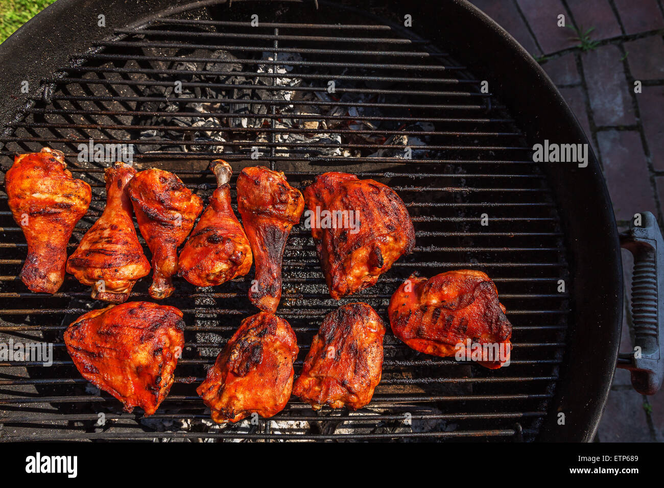 Chicken legs smoked barbecue cooked on charcoal grill Stock Photo Alamy