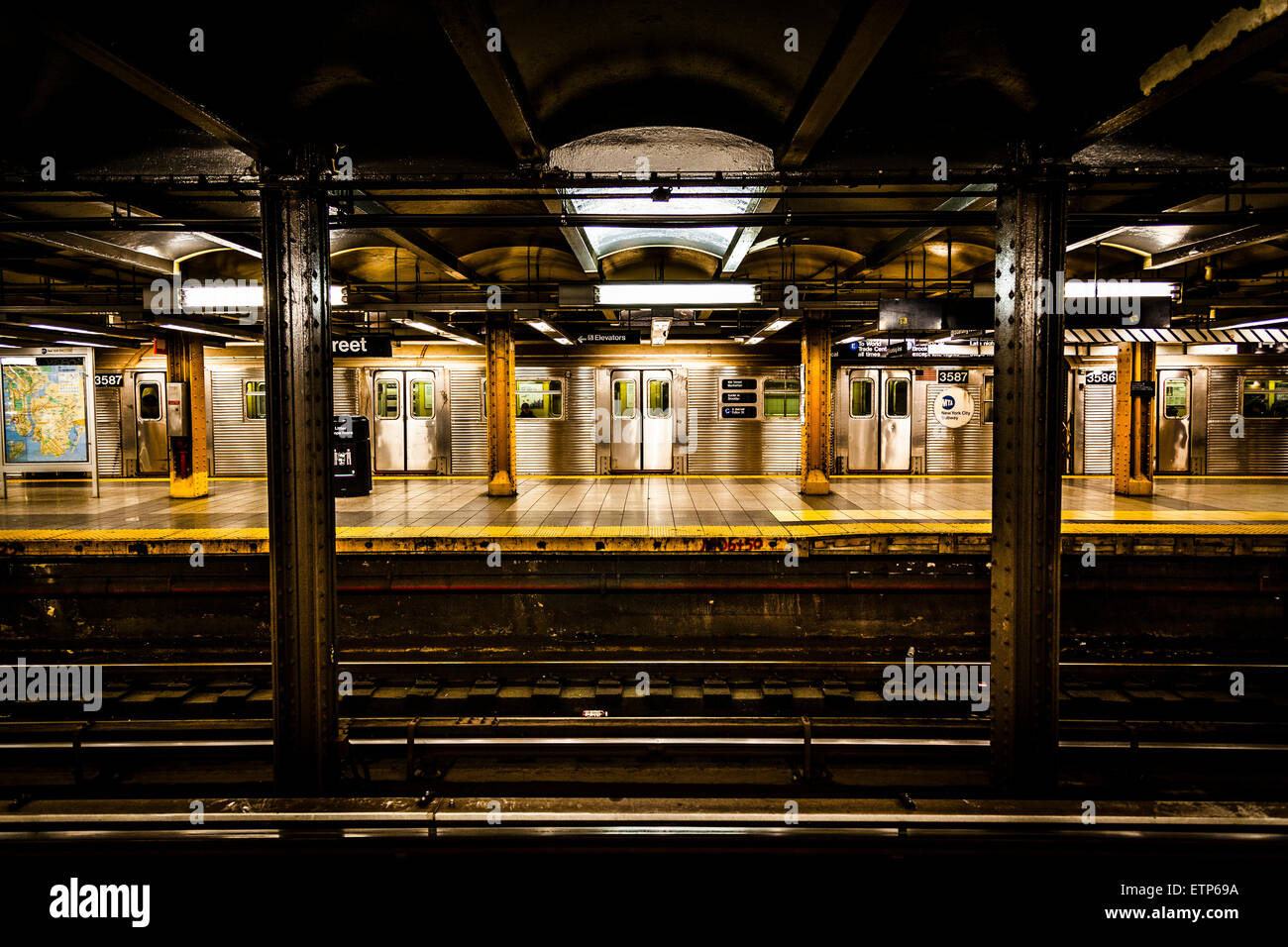 Platform on the NYC Subway is one of the oldest and most extensive public transportation systems in the world Stock Photo