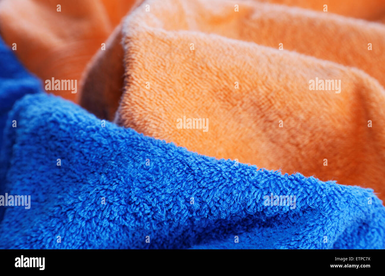 Dark blue and orange fabric with fibres a background Stock Photo Alamy
