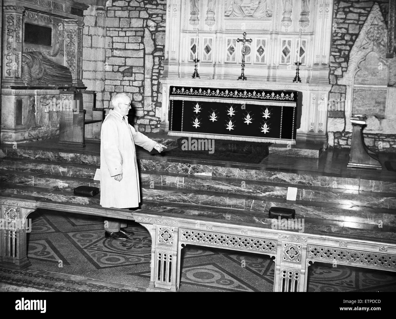 A diviner's tests have shown an indication of gold buried in Crediton Parish Church, Devon 7th December 1954. Stock Photo