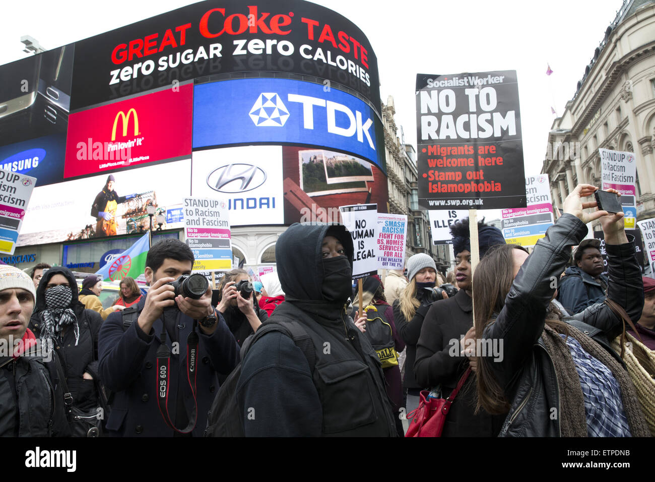 Large anti-racist march organised by UAF meets a counter demonstration by Britain First under the Eros statue in Piccadilly Circus  Featuring: Atmosphere Where: London, United Kingdom When: 21 Mar 2015 Credit: Seb/WENN.com Stock Photo