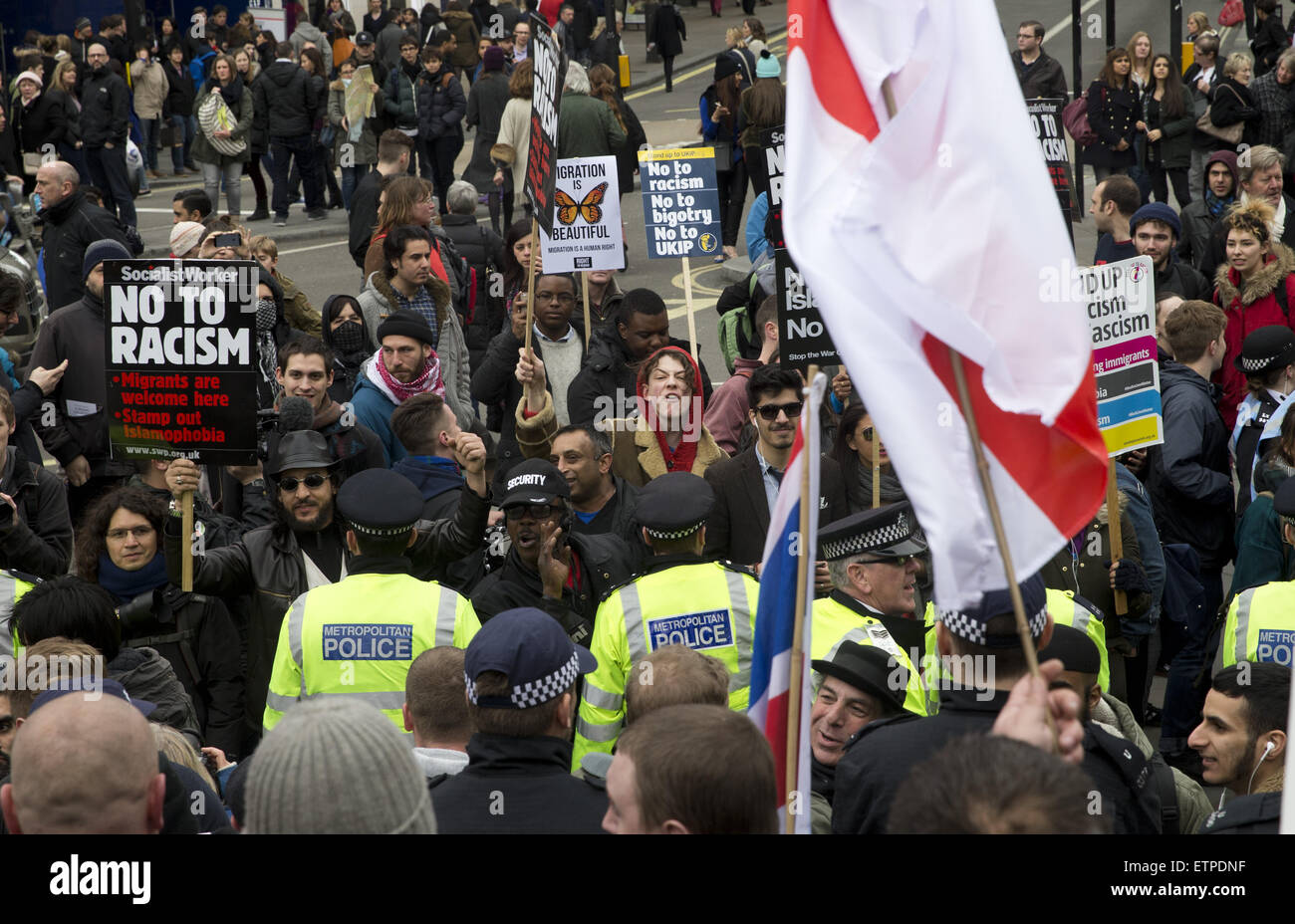 Large anti-racist march organised by UAF meets a counter demonstration by Britain First under the Eros statue in Piccadilly Circus  Featuring: Atmosphere Where: London, United Kingdom When: 21 Mar 2015 Credit: Seb/WENN.com Stock Photo