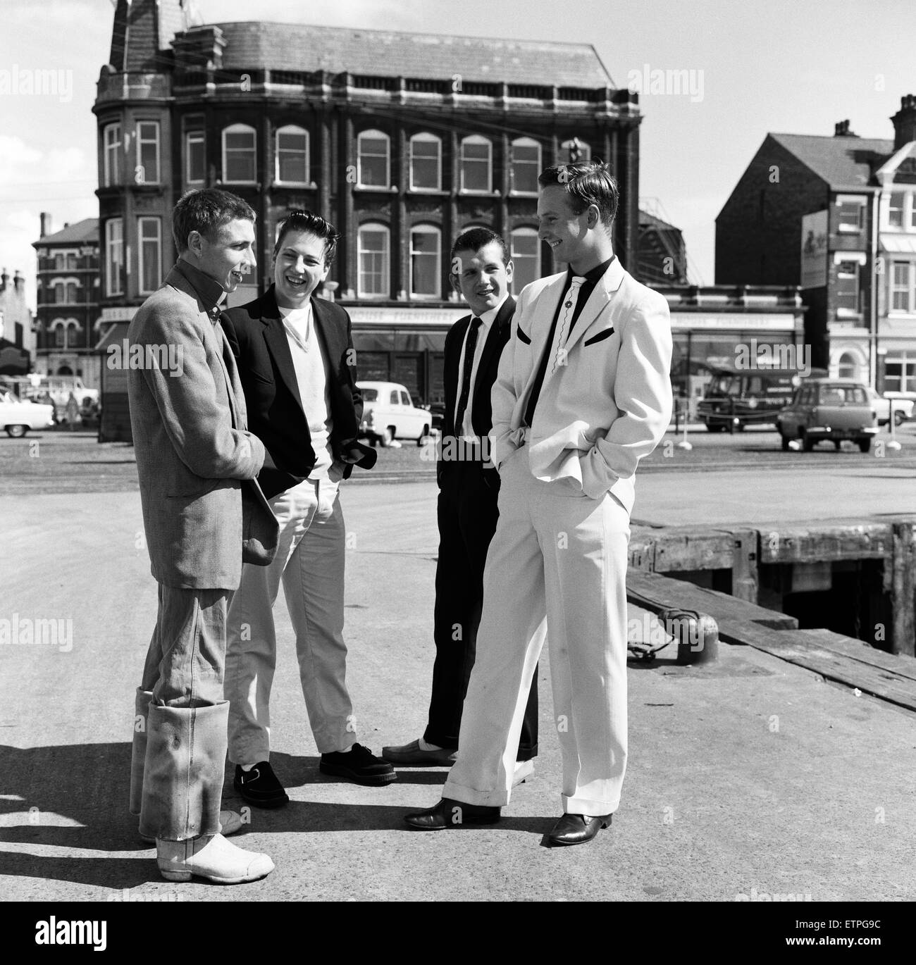 A new craze - Fancy suits worn by trawler fishermen at Lowestoft, Suffolk. Hylton Brighty, aged 16, wearing a white suit trimmed with black. 19th July 1961. Stock Photo