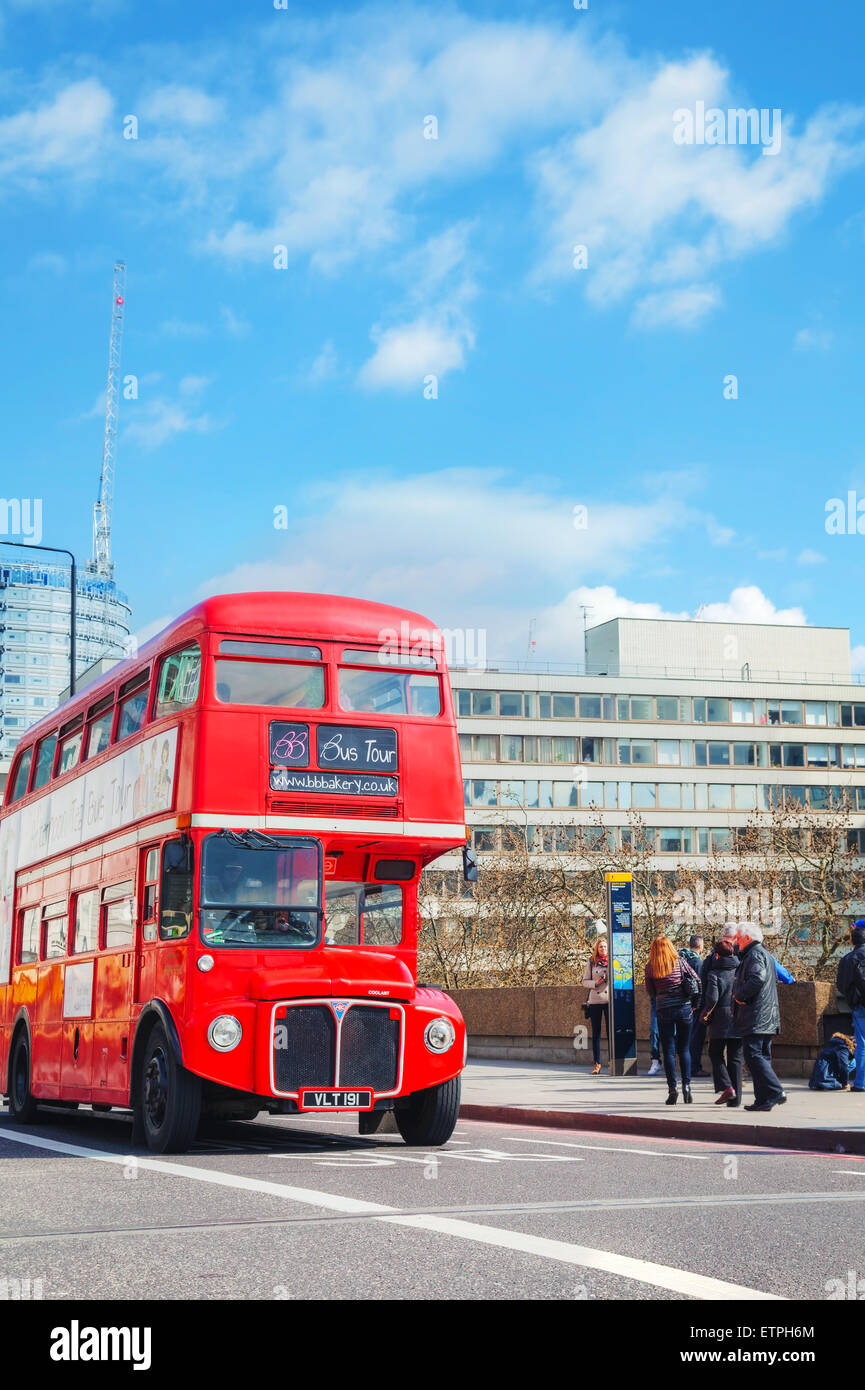 LONDON - APRIL 5: Iconic red double decker bus on April 5, 2015 in London, UK. The London Bus is one of London's principal icons Stock Photo