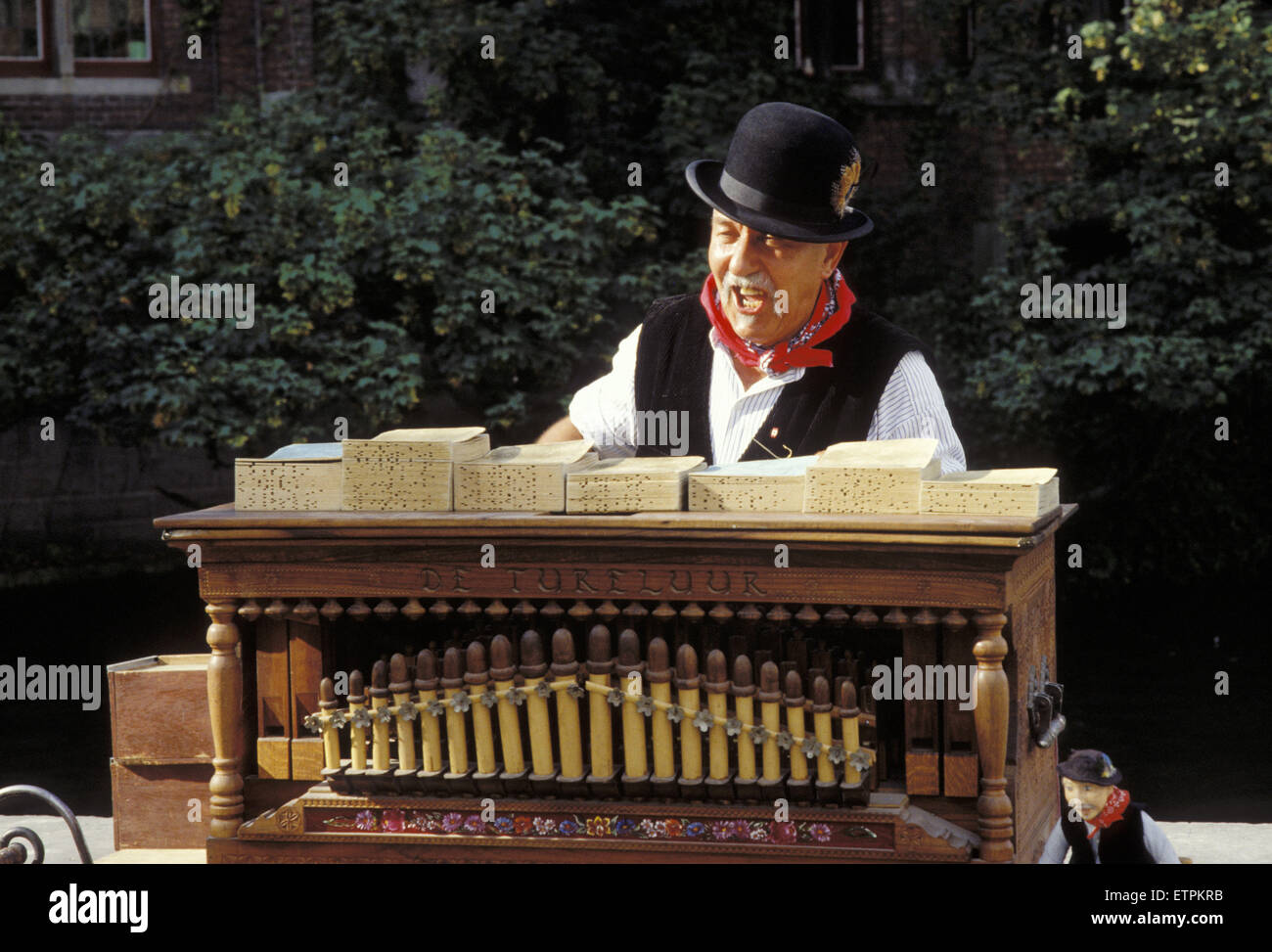 BEL, Belgium, Bruges, barrel organ player at the Dijver.  BEL, Belgien, Bruegge, Drehorgelspieler am Dijver. Stock Photo
