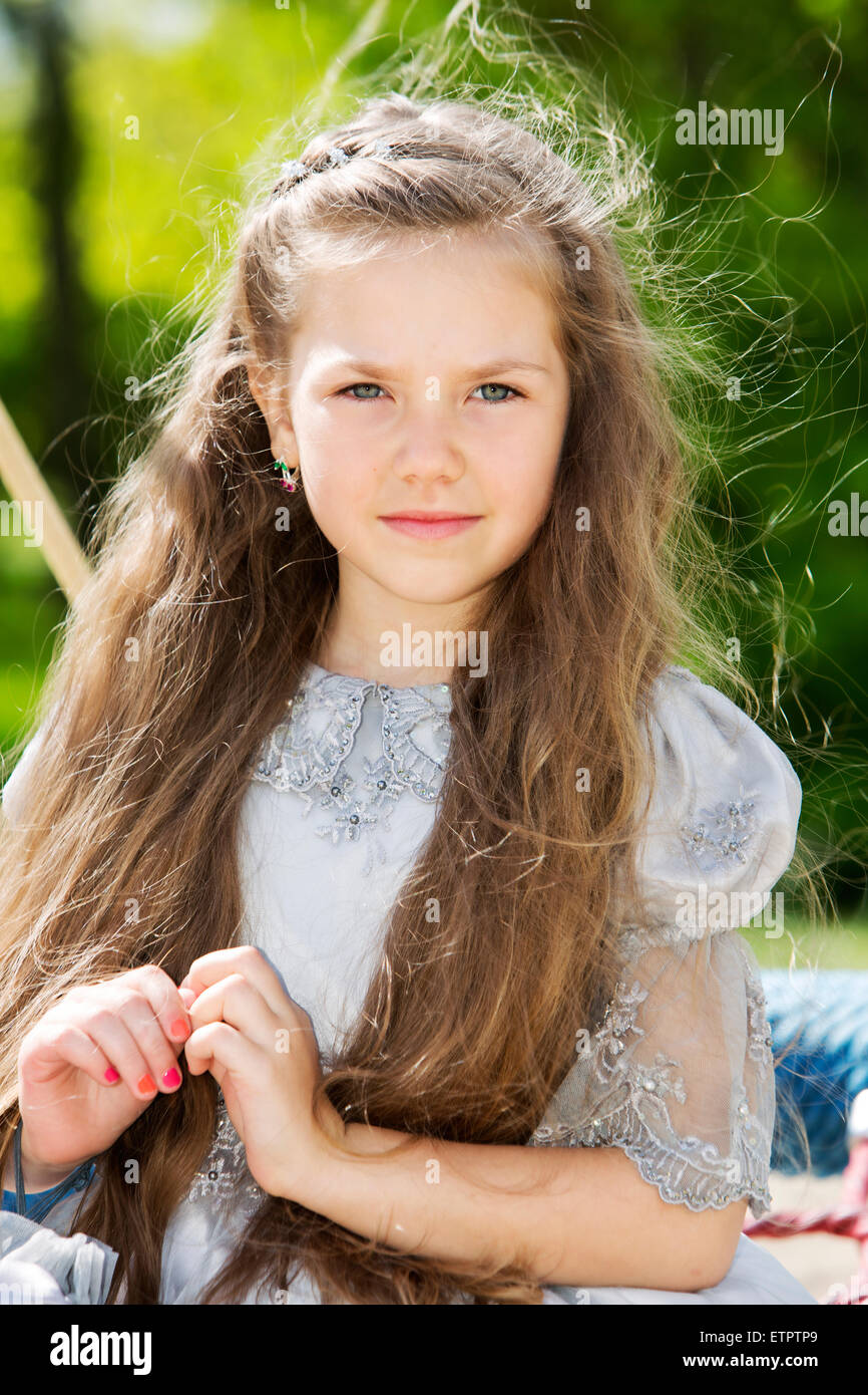 Portrait of a girl in the park Stock Photo - Alamy