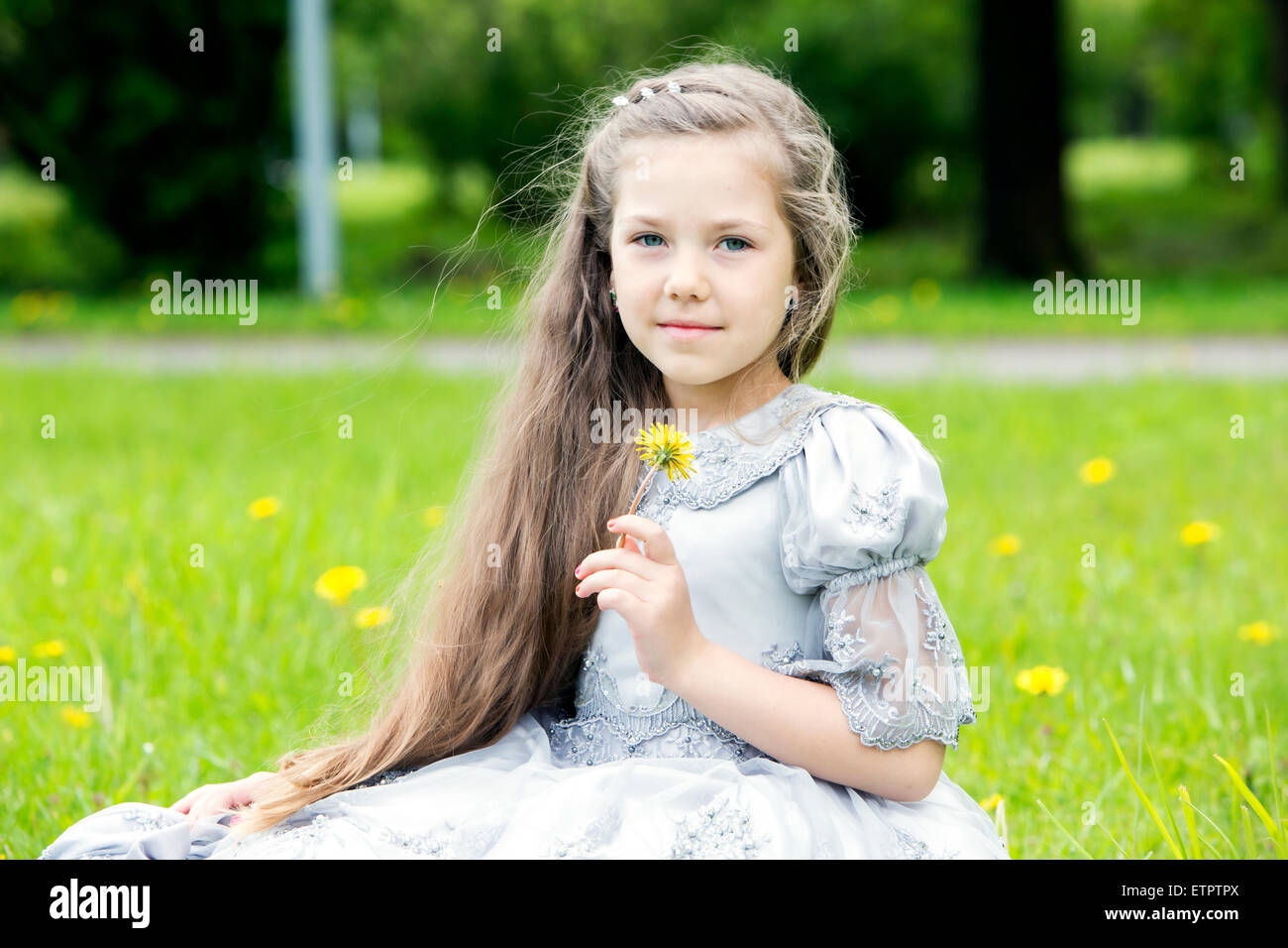 Portrait of a girl in the park Stock Photo - Alamy