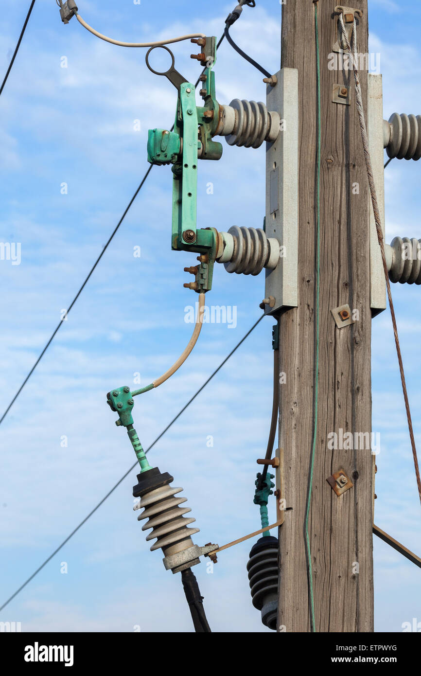 Utility pole with insulators and wires Stock Photo Alamy