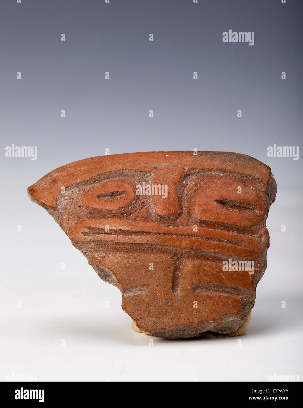 anthropomorphic representation on fragment of vessel, ancient art of ecuador Stock Photo