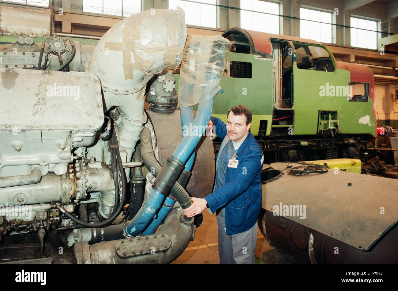 ICI Train Preservation, 4th January 1994. Terry Bye, with one of the two power units of the Deltic. The Napier Deltic valveless, two-stroke Diesel engine. Stock Photo