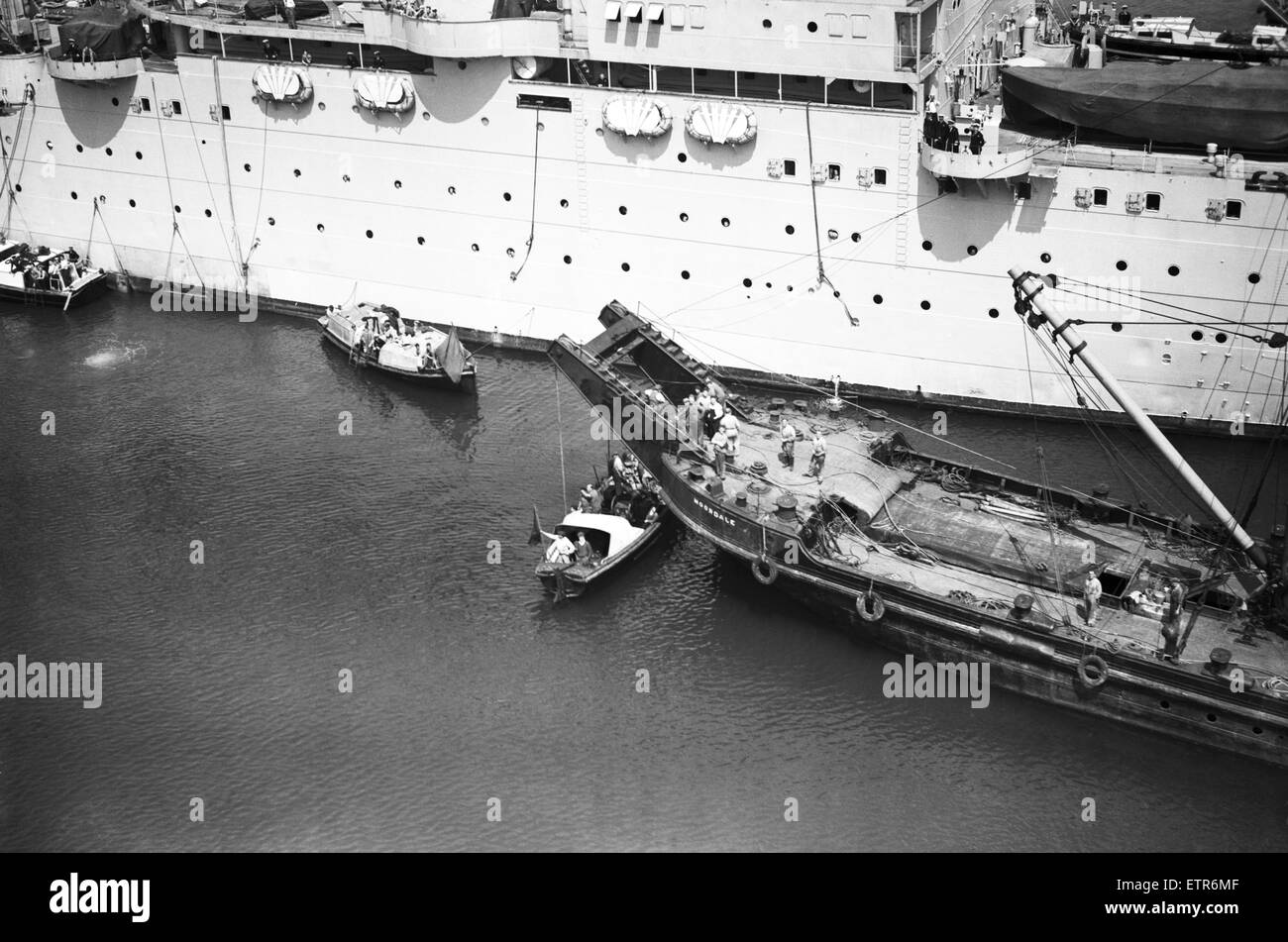 HM Submarine Sidon sank in Portland Harbour after an explosion. She was moored alongside the HMS Maidstone at the time. 16th June 1955. Stock Photo