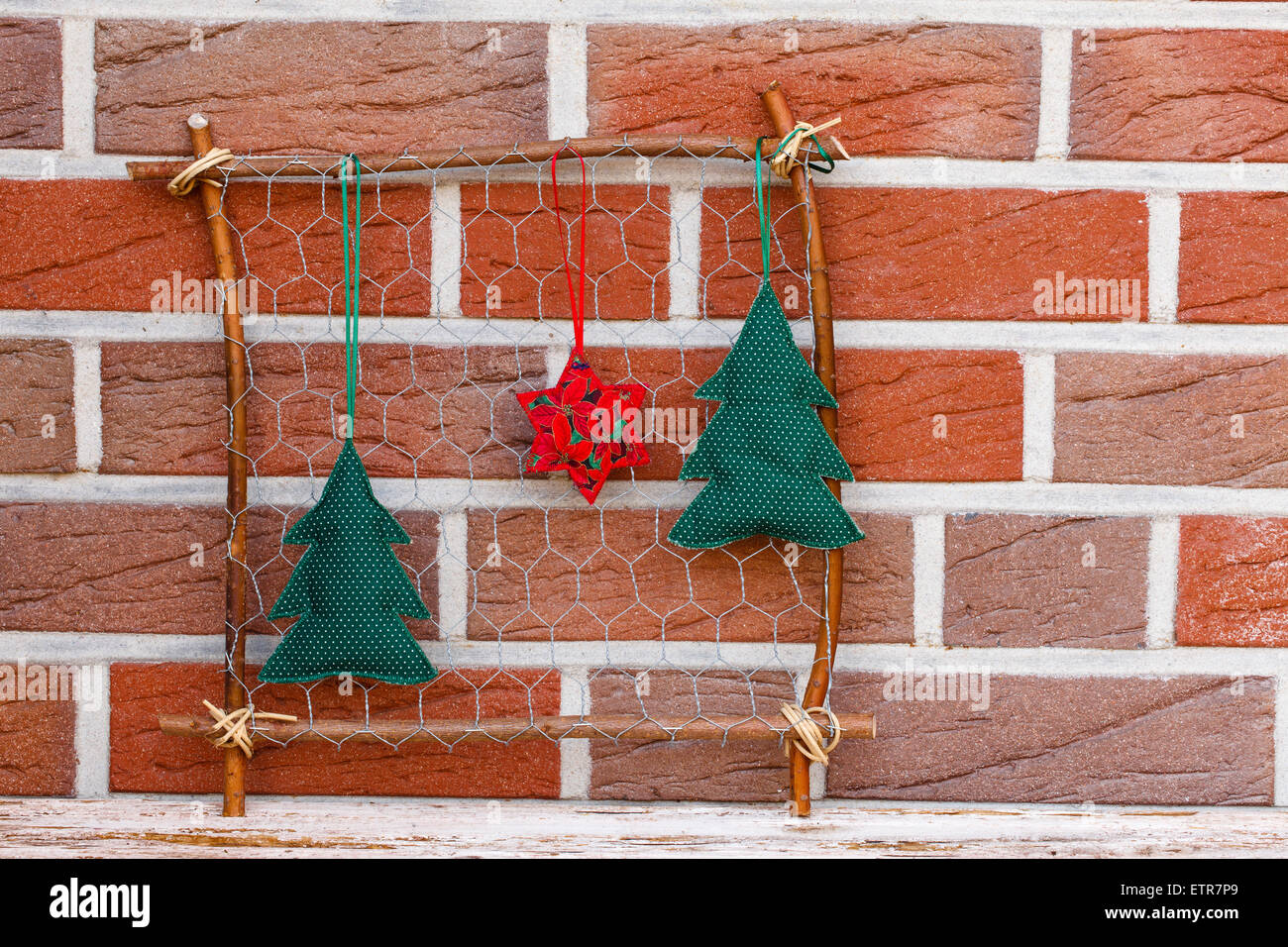 Frame made of wire mesh, Star and Christmas tree made of cloth Stock