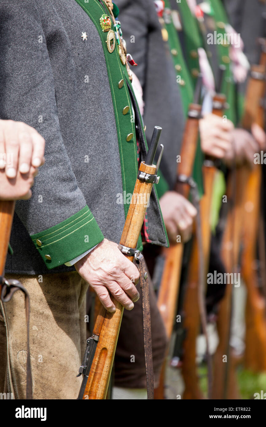 Tyrolean shooters with traditional clothing and guns, Austria, Tyrol, Ehrwald Stock Photo