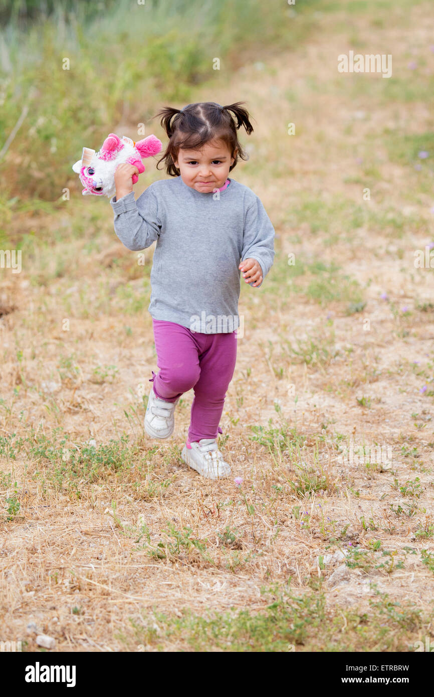 Beautiful caucasian girl running and laughing Stock Photo Alamy