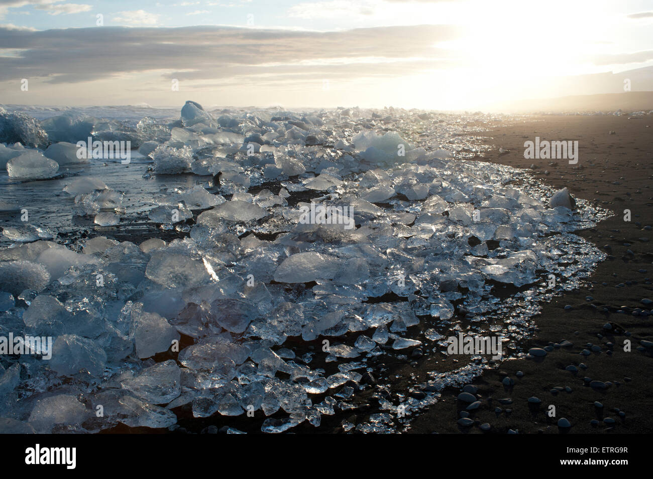 ice, icebergs, black lava beach, glacier lagoon, Jökulsarlon, South Iceland Stock Photo