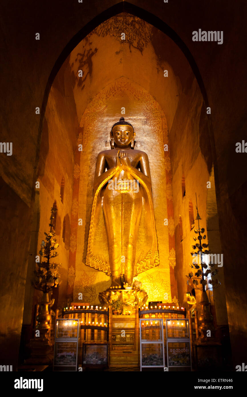 Golden Buddha statue at Ananda temple in Bagan, Myanmar Stock Photo