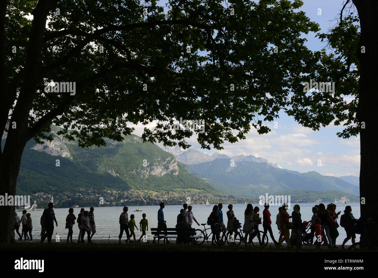 Lake Annecy in France busy people walking walkers tourists Stock Photo