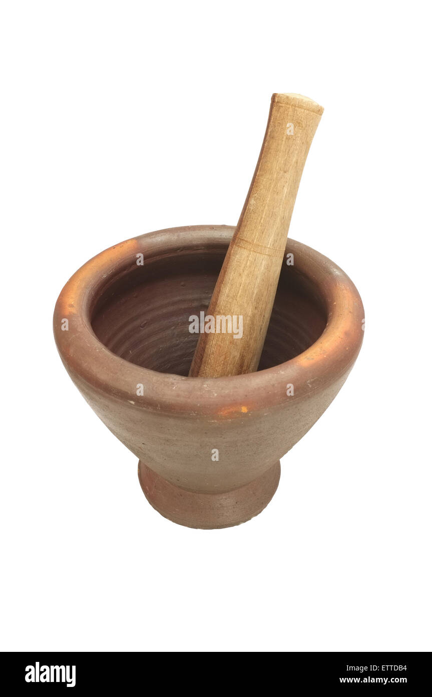 Clay mortar and wooden pestle isolated on white background Stock Photo