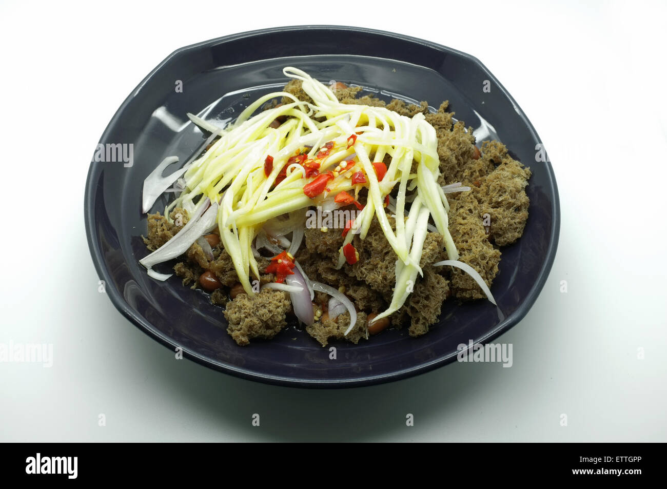 Crispy catfish salad with green mango, Thai food Stock Photo Alamy