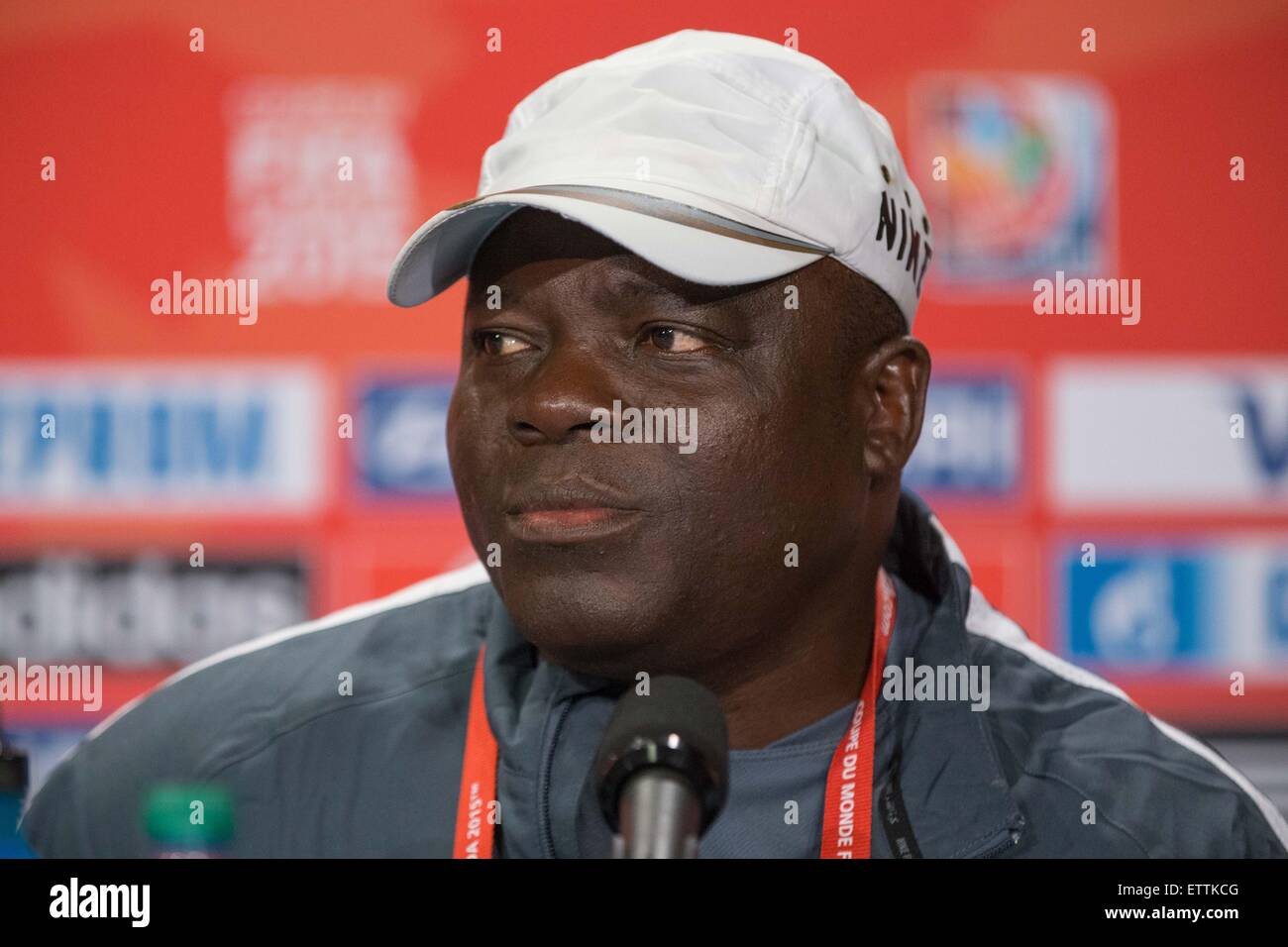 Vancouver, Canada. 15th June, 2015. Edwin OKON coach of the Nigerian team at a press conference prior to a Group D match at the FIFA Women's World Cup Canada 2015 between Nigeria and the USA at BC Place Stadium on 16 June 2015 in Vancouver, Canada. Sydney Low/Cal Sport Media.June 15, 2015: at a press conference prior to a Group D match at the FIFA Women's World Cup Canada 2015 between Nigeria and the USA at BC Place Stadium on 16 June 2015 in Vancouver, Canada. Sydney Low/Cal Sport Media. Credit:  csm/Alamy Live News Stock Photo