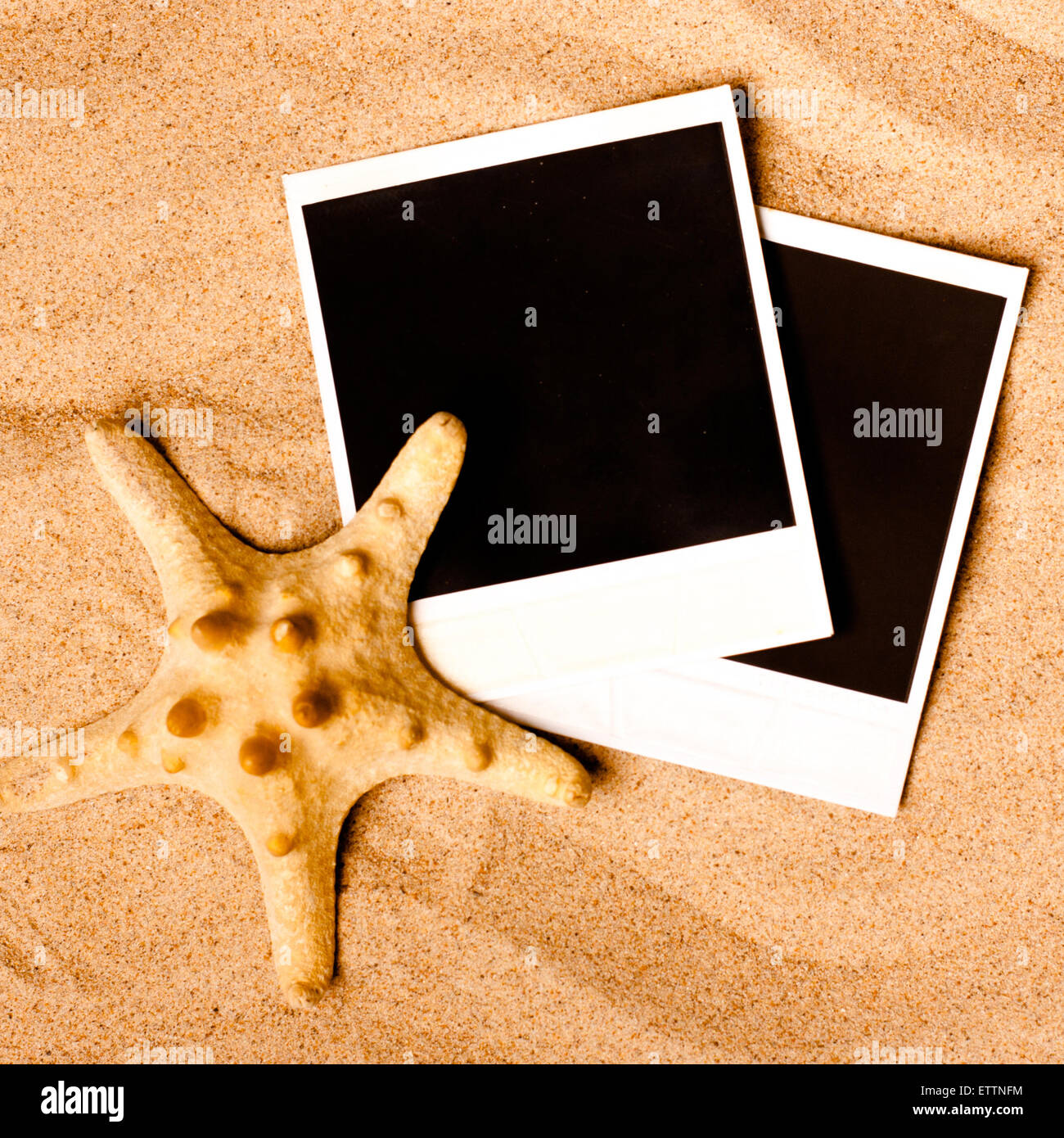 Instant photo frames on the beach Stock Photo - Alamy