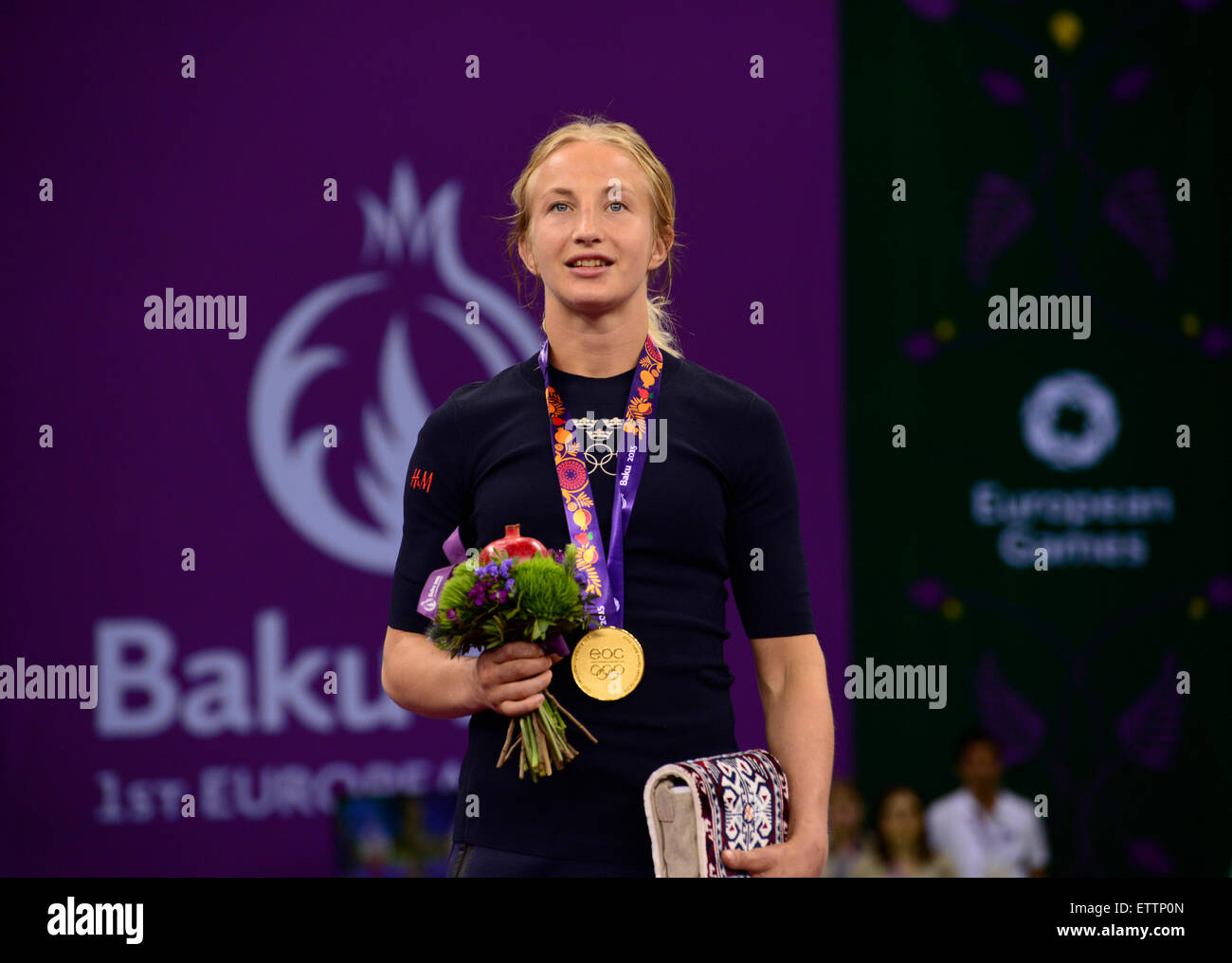 Baku. 15th June, 2015. Mattson Sofia of Sweden reacts during the awarding ceremony of the women's 55kg wrestling event at the European Games in Azerbaijan's capital of Baku on June 15, 2015. Mattson Sofia won the gold medal. Credit:  Tofik Babayev/Xinhua/Alamy Live News Stock Photo