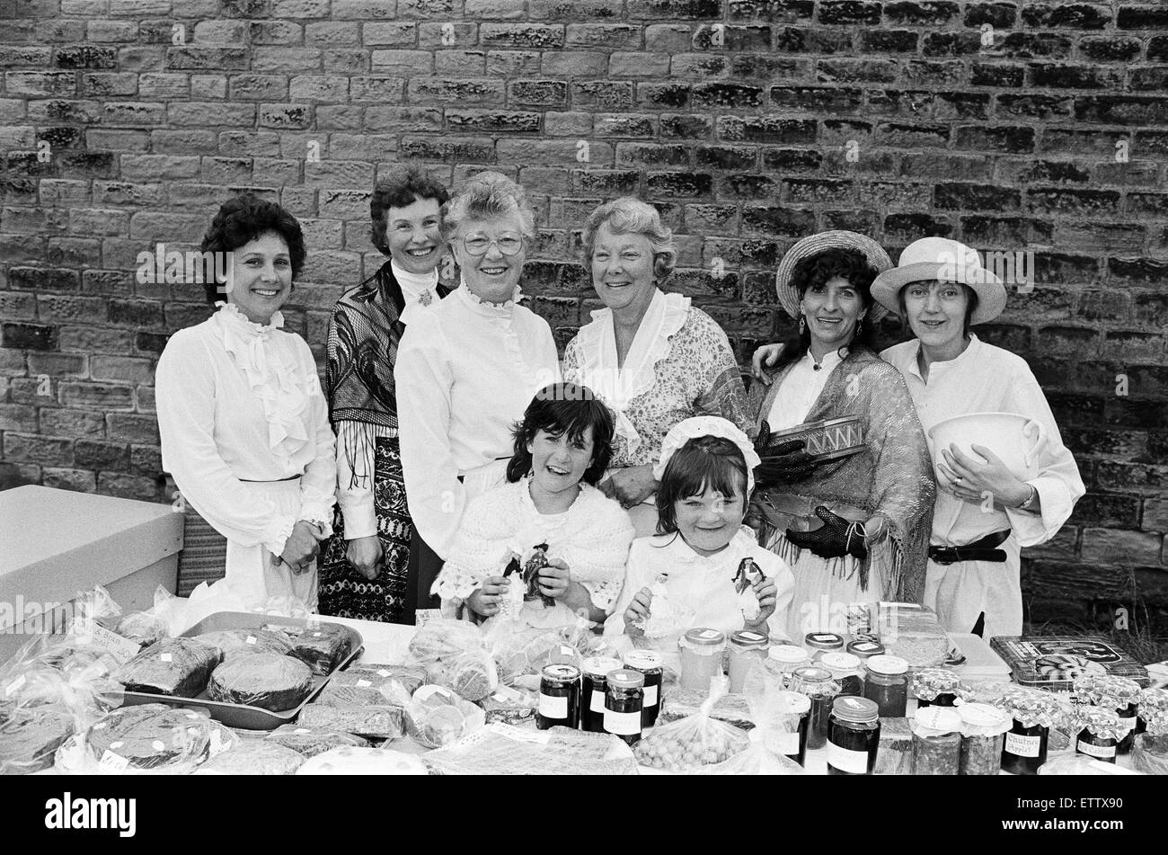 Dressed for the occasion- stallholders at Slaithwaithe Elizabethan fair. The event was the first carnival to be held in Slaithwaithe for several years, but it is hoped it will now be an annual event. About 150 people joined the procession, which included Stock Photo