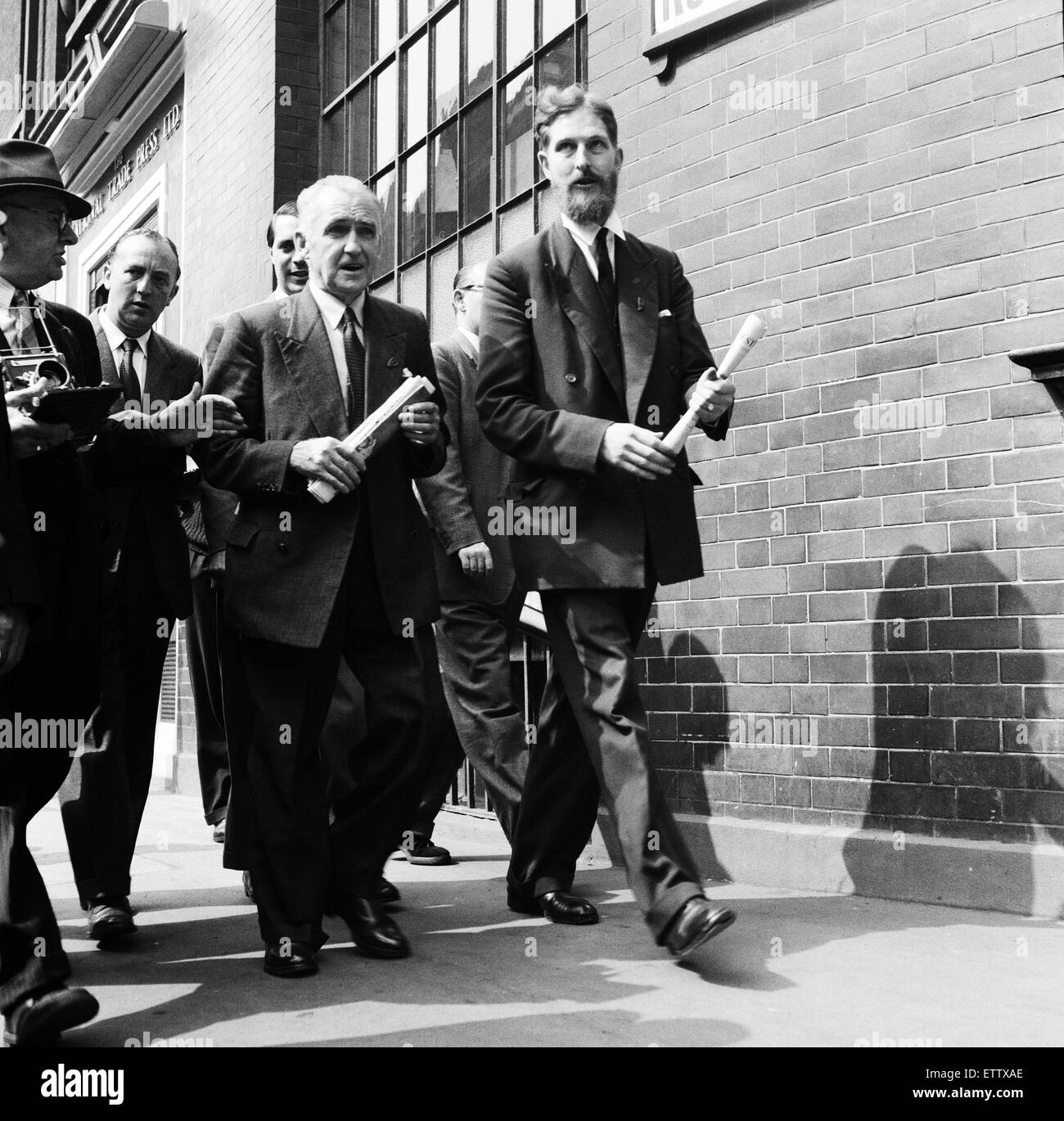 Pictured, Philip Kinghorn Burbridge with Mr Austen Brooks (with beard), a member of The League of Empire Loyalists.  Mr Philip Kinghorn Burbridge, who slapped Lord Altrincham (critic of the Queen), as he came out of Television House, London. 7th August 19 Stock Photo