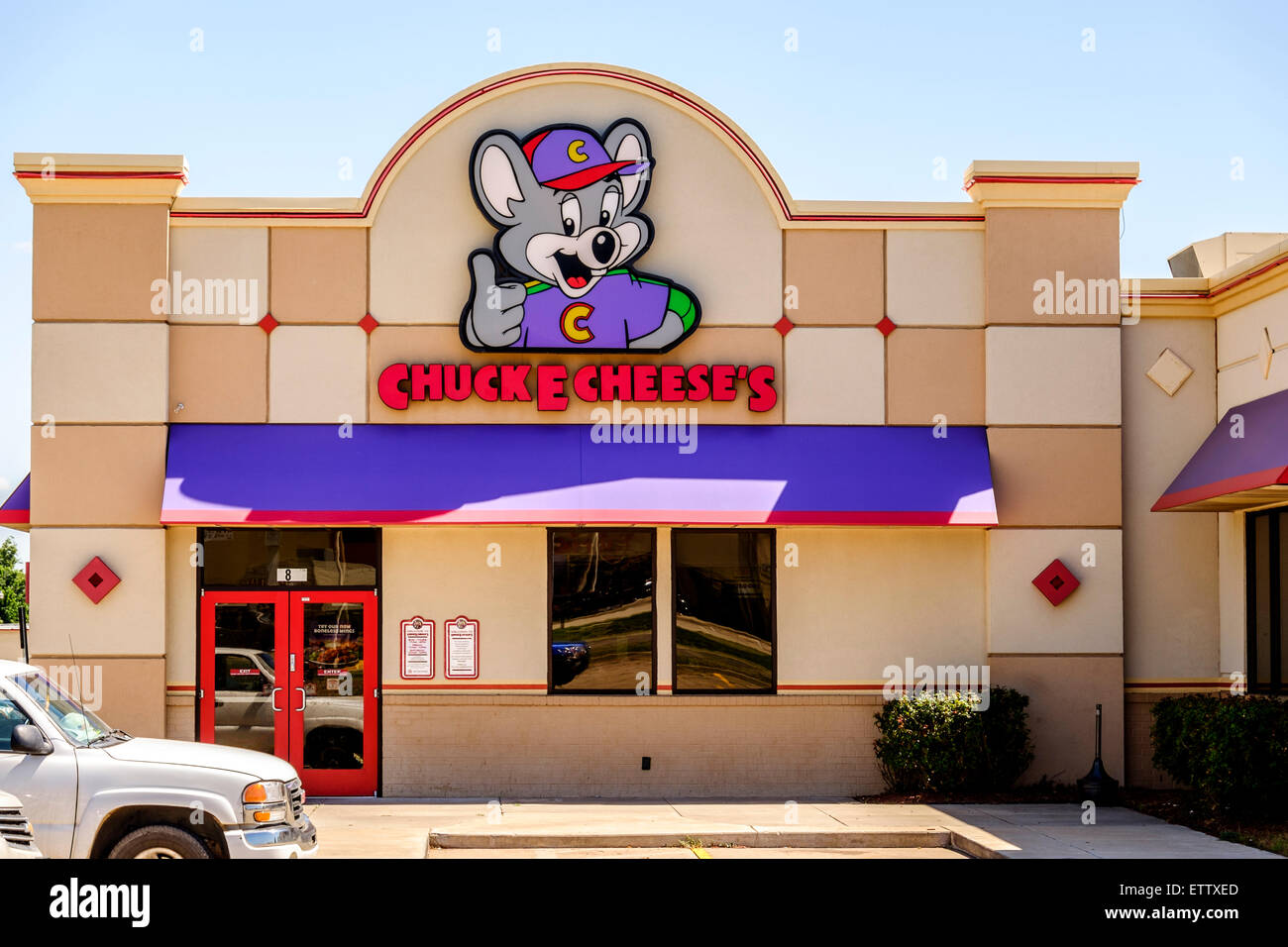 The exterior storefront of a ChuckECheese's, a pizzaria and family entertainment establishment. Oklahoma City, Oklahoma, USA. Stock Photo