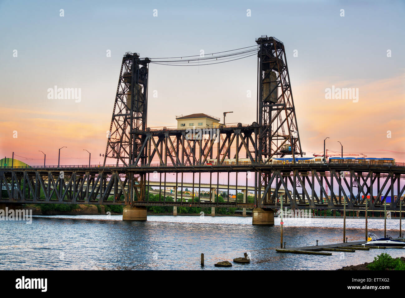 View of the Steel Bridge at dusk in Portland, Oregon Stock Photo