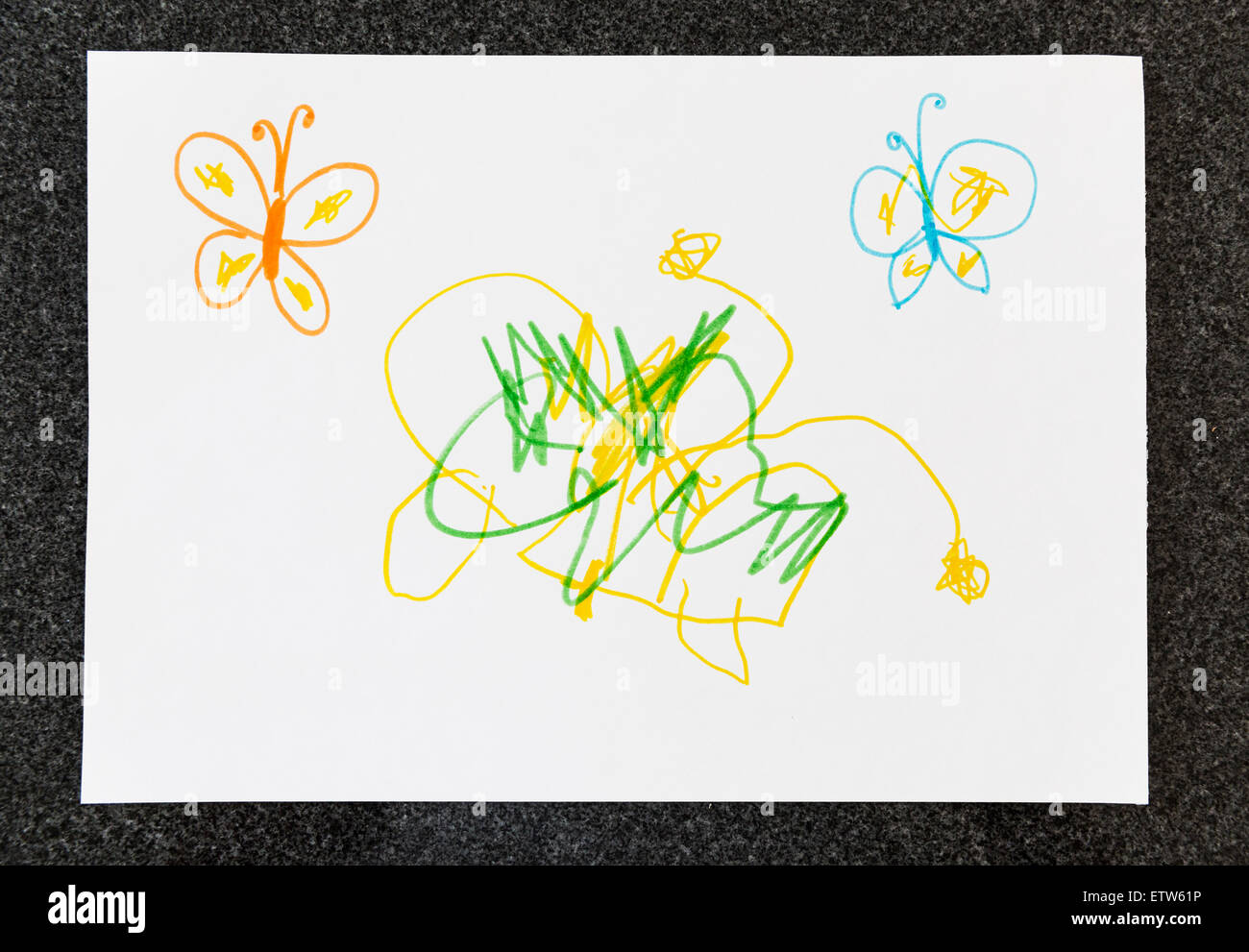 Child's drawing of butterflies on paper Stock Photo