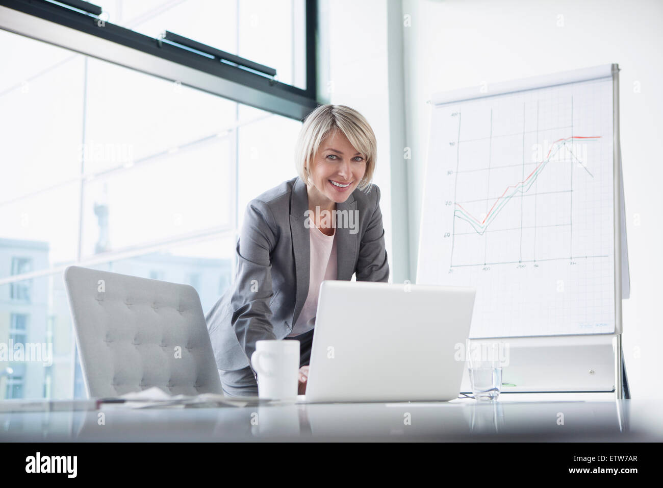 Female manager preparing presentaion Stock Photo - Alamy