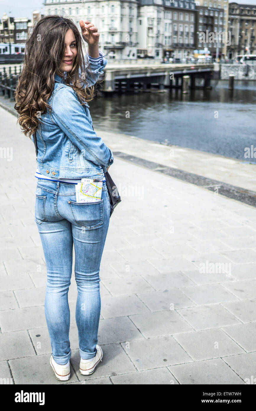 Netherlands, Amsterdam, female tourist with city map in her trouser pocket  Stock Photo - Alamy