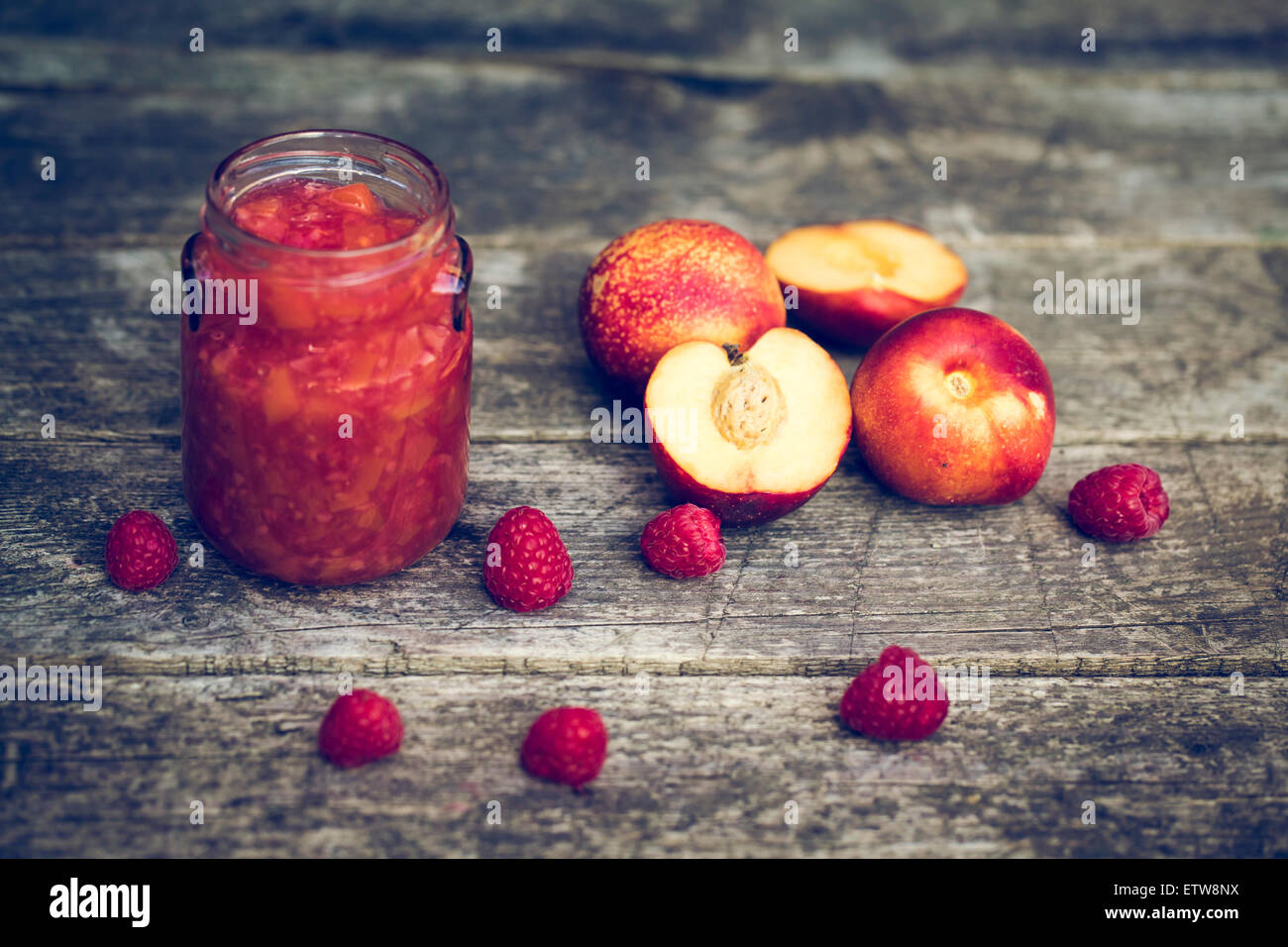 Strawberry nectarine jam in glass Stock Photo Alamy