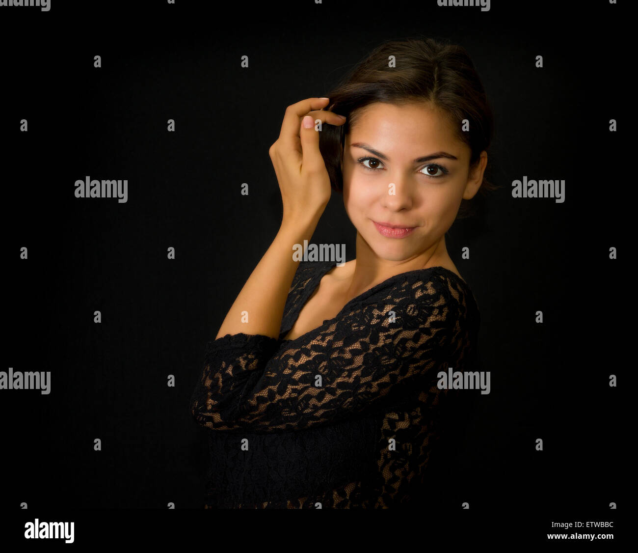 Portrait of beautiful young girl in black Stock Photo - Alamy