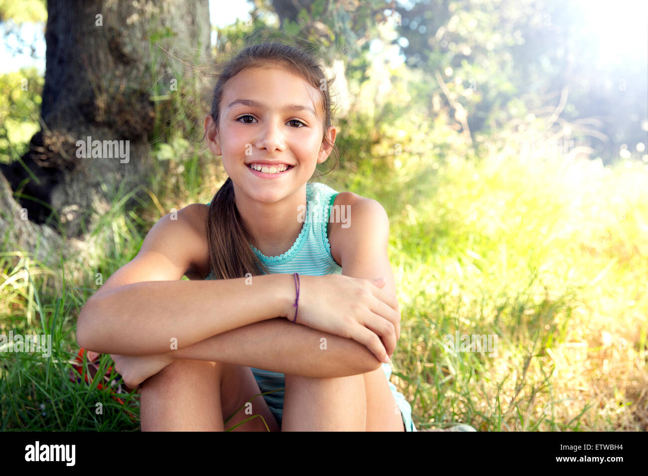 Portrait of smiling girl outdoors Stock Photo - Alamy