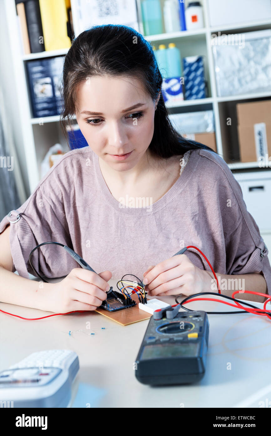 girl using a multimeter Stock Photo Alamy