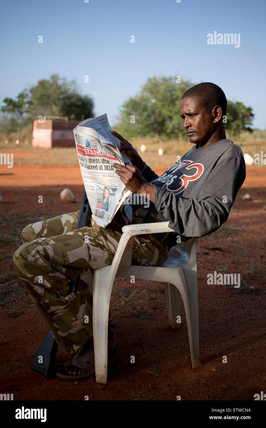 Kenya Wildlife Ranger Nelson Munga from the anti poaching unit relax at a temporally base in Tsavo East game park in Kenya 6 June 2013. PHOTO/KAREL PRINSLOO Stock Photo