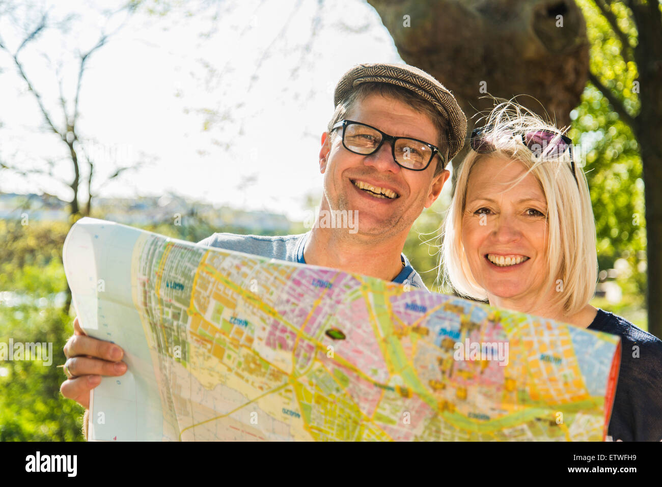 Germany, Mannheim, Mature couple taking city break, looking at map Stock Photo