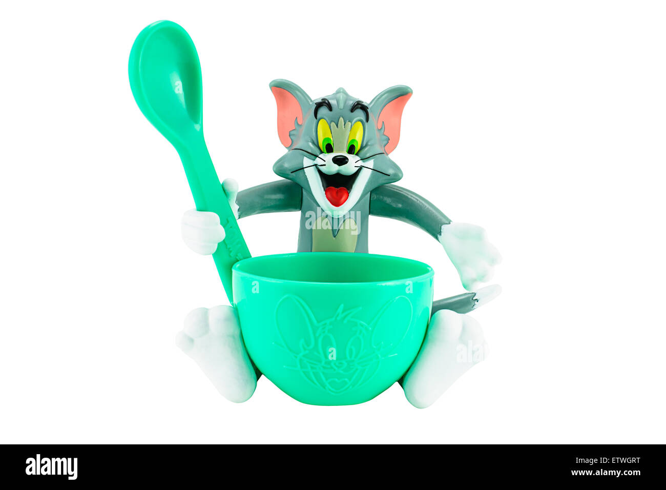 Bangkok,Thailand - February 13, 2015: Tom gray cat with dish and spoon toy character form Tom and Jerry animation cartoon. Stock Photo