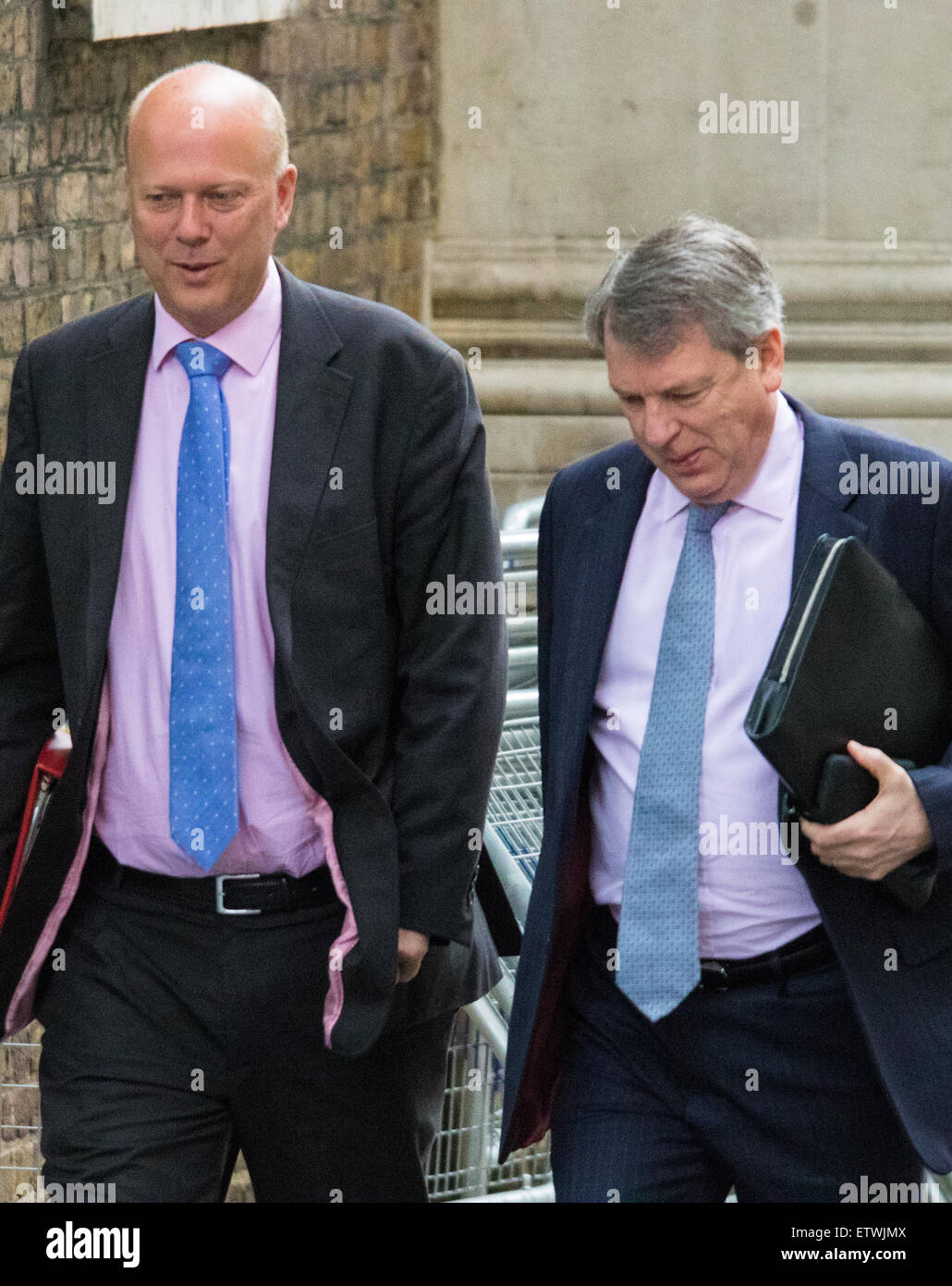 Downing Street, London, UK. 16th June, 2015. Leader of the House of Commons Chris Grayling arrives at 10 Downing Street for the weekly cabinet meeting, accompanied by political strategist Lynton Crosby. Credit:  Paul Davey/Alamy Live News Stock Photo