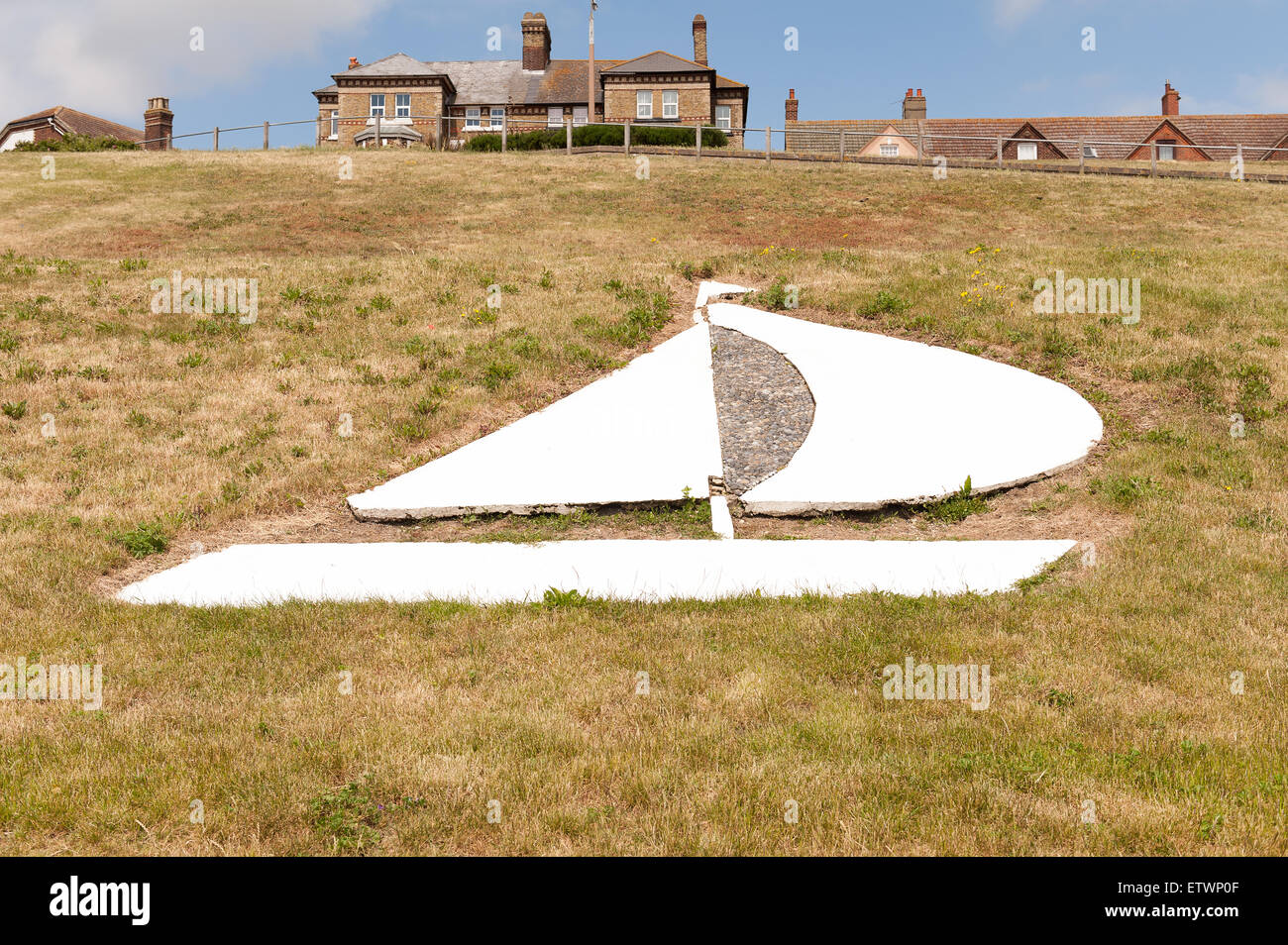 iconic metal sailing ship design on grass bank verge at Dovercout bay Stock Photo