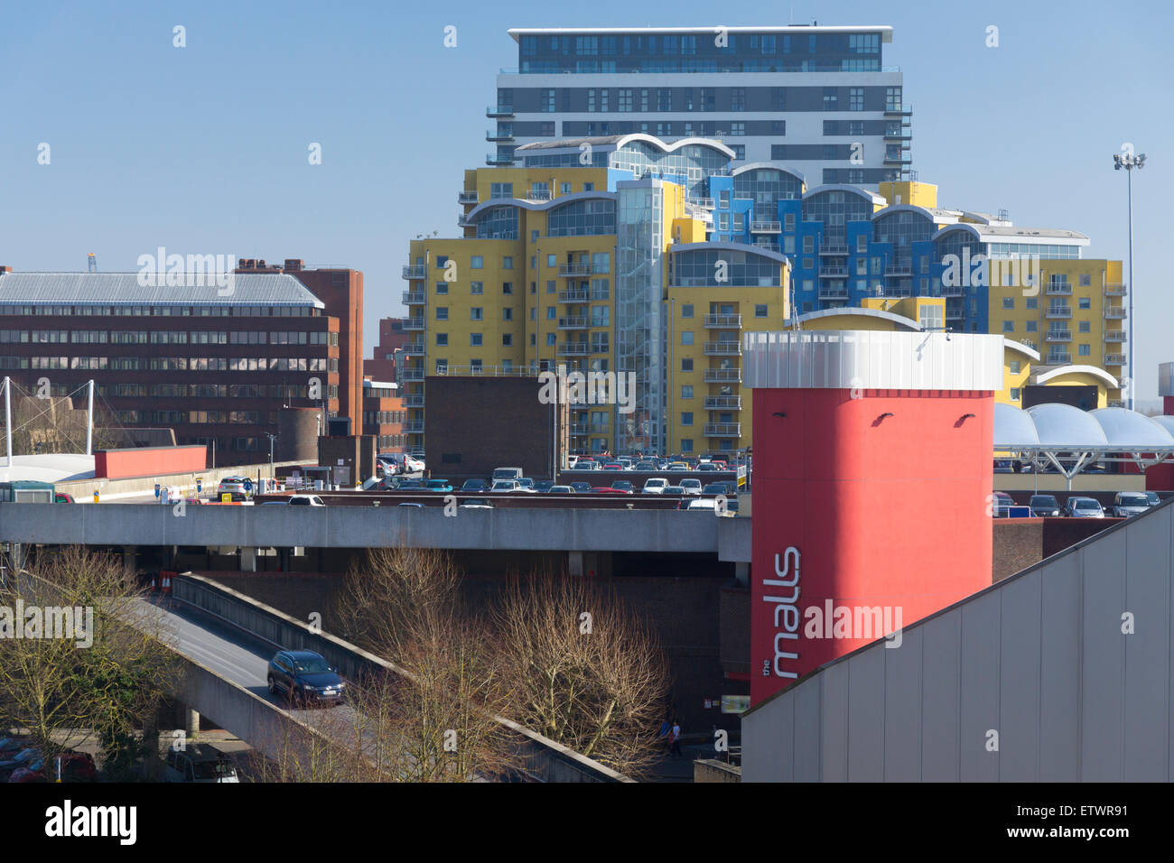 A view on The Malls shopping centre and car park, Crown Heights flats and the IBM building in Basingstoke, Hampshire, England Stock Photo