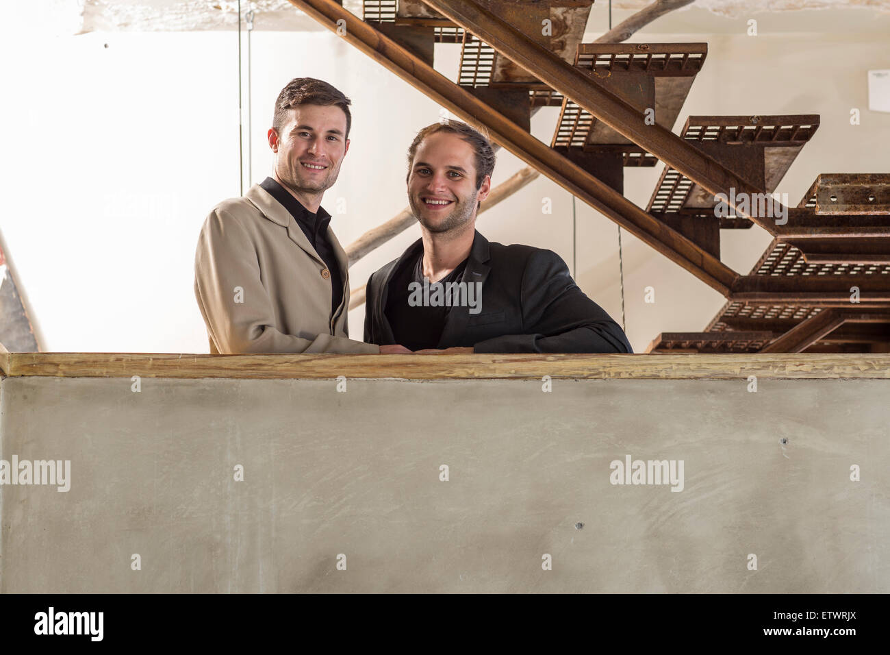 Portrait of two smiling man Stock Photo - Alamy