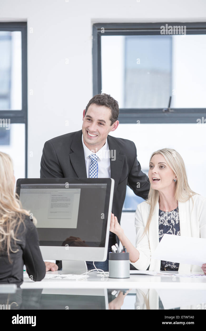 Businesspeople having a meeting in office Stock Photo - Alamy
