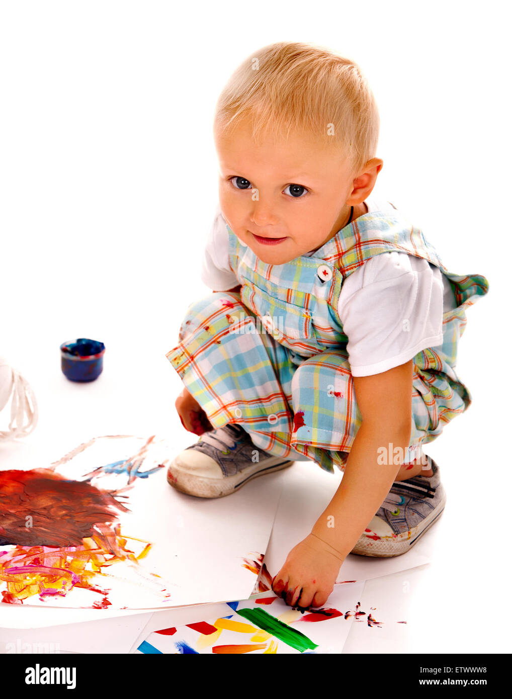 Child painting by finger paint Stock Photo Alamy